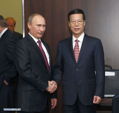 Владимир Путин и Чжан Гаоли. Фото: Агентство Синьхуа